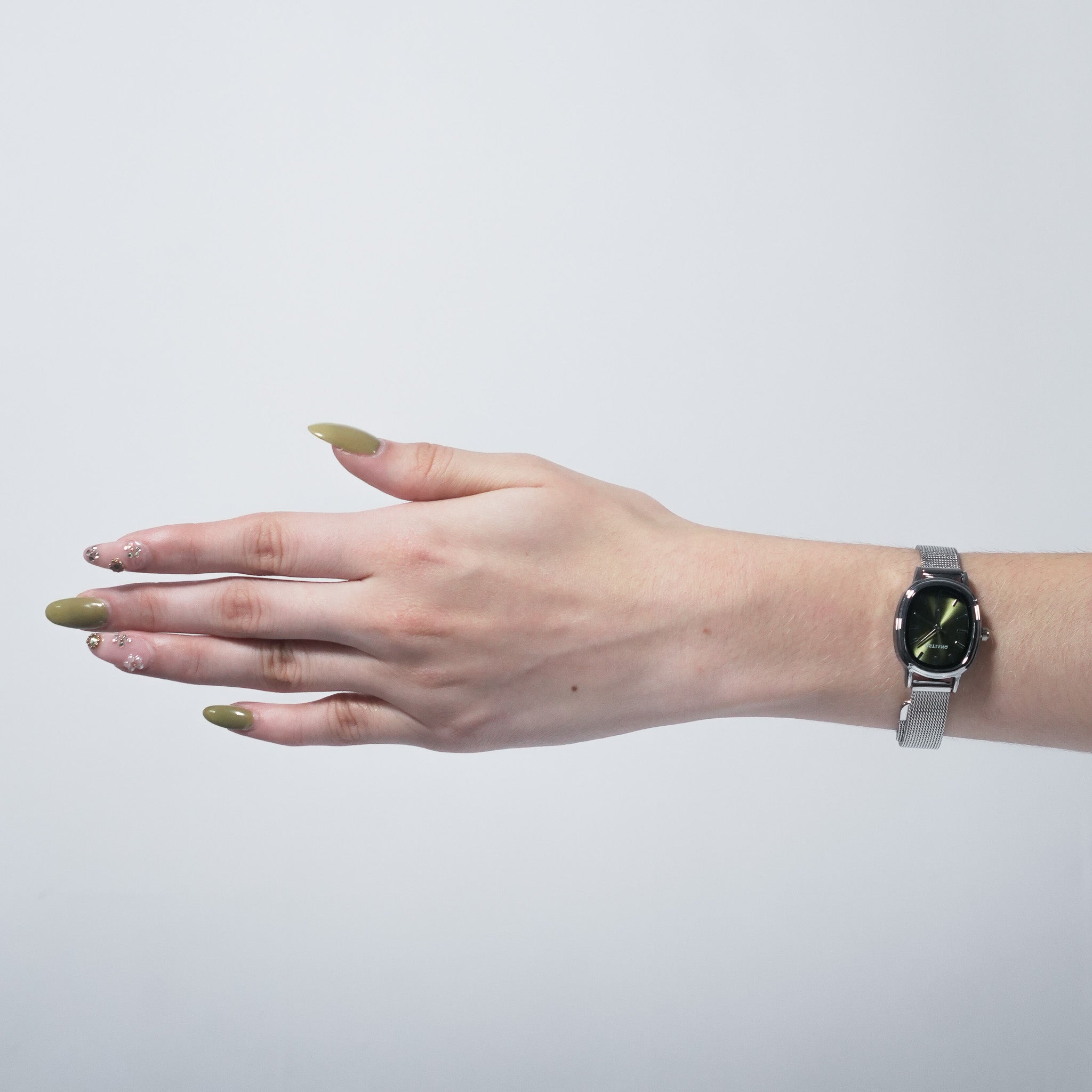 reloj ovalo extensible tejido