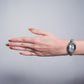 Reloj ovalo con piedras