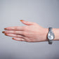 Reloj triangulo ajustable plateado